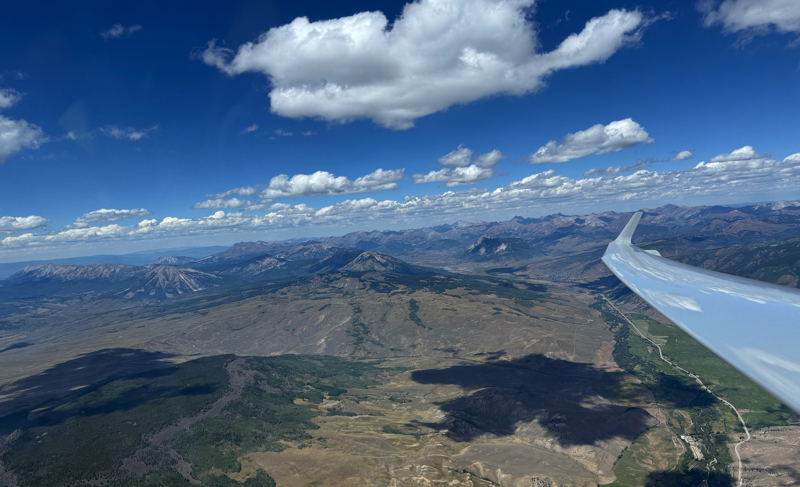 Boulder glider flys by Crested Butte